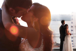 sunset kiss at Seattle Waterfront from the Four Seasons Hotel