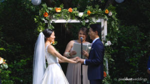bellevue's best wedding videographer captures a real ceremony moment at the Robinswood House in Bellevue