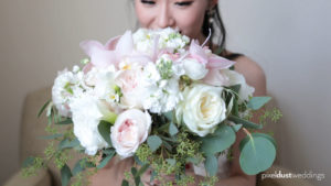 bridal boquet of flowers for wedding videographer