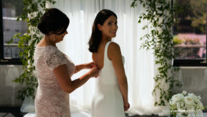 bride gets her wedding dress on at almquist winery in seattle