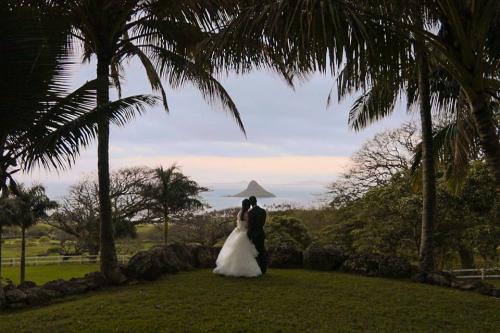 Watching the sun go down from destination wedding video hawaii